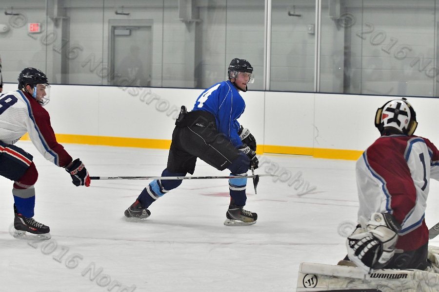 Wheaton College Men\'s Ice Hockey vs Middlesex Community College. - Photo By: KEITH NORDSTROM